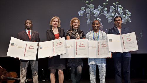 Five of the six World Water Week award winners with their awards, (from left to right),: Alain Tossounon, Francesca de Châtel, Berta Tilmantaite, Francis Odupute,  Ketan Trivedi  2012 WASH Media Awards. 2012 World Water Week. Photo credits: Mikael Ullén.